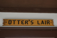 Otters-Lair-Sign